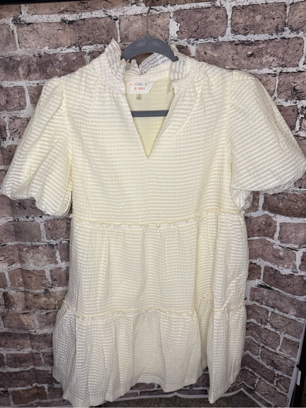 Fantastic Fawn Cream Ruffle Neck Tiered Dress